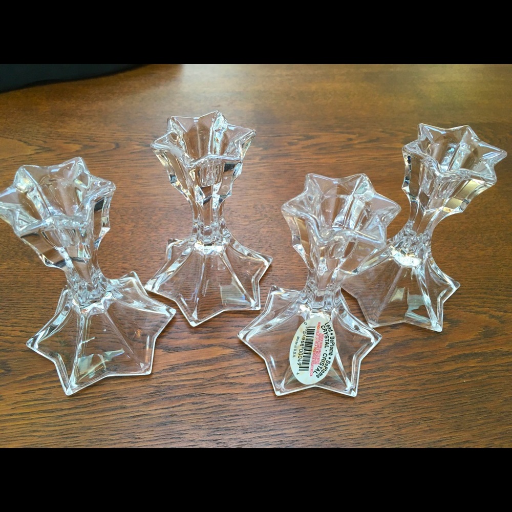 4 Beautiful Lead Chrystal candlesticks.No chips/dings. 4”tall. Grace your table!